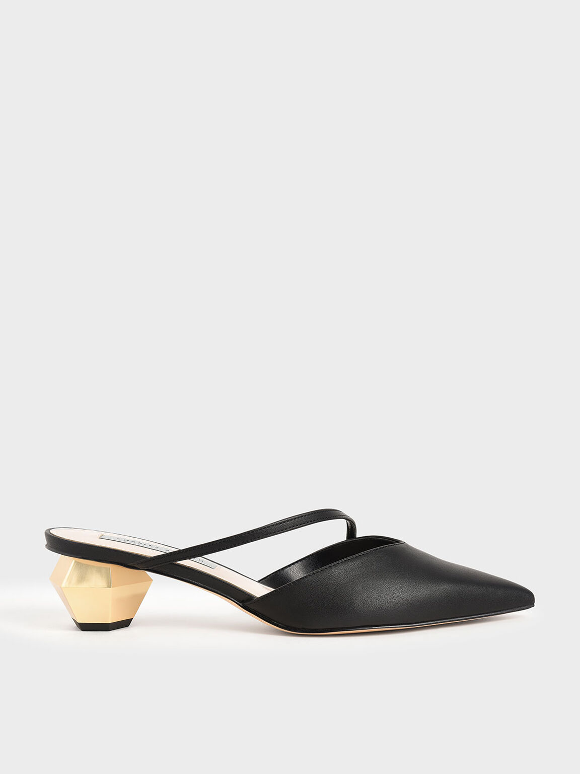Petra Asymmetric Strap Chrome Heel Mules in Black, product photograph