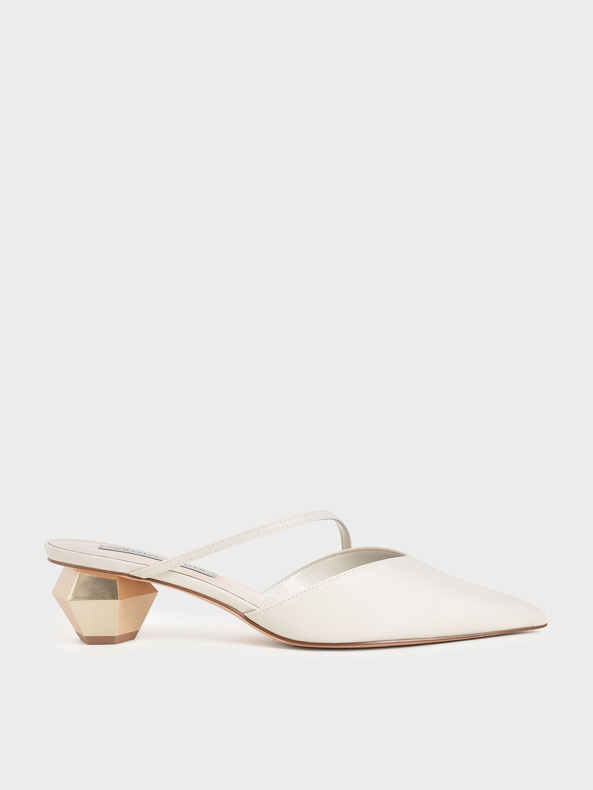 Petra Asymmetric Strap Chrome Heel Mules in Chalk, product photograph
