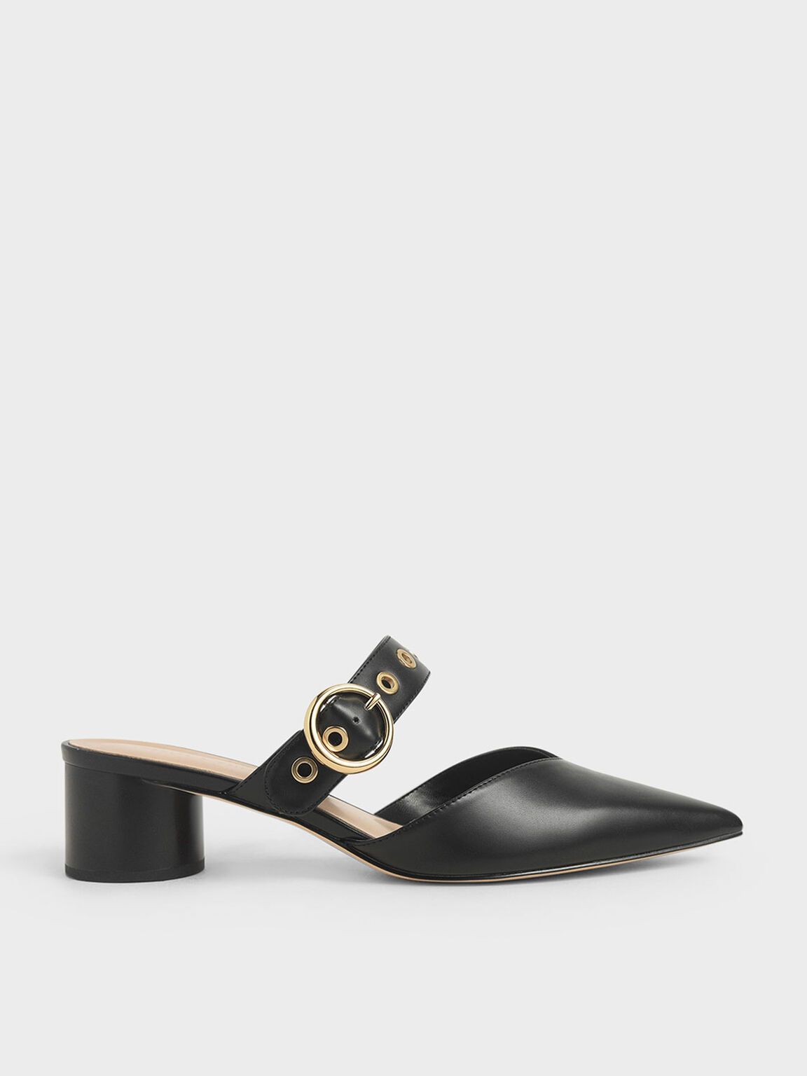 Kiara Grommet Mules in Black, product photograph