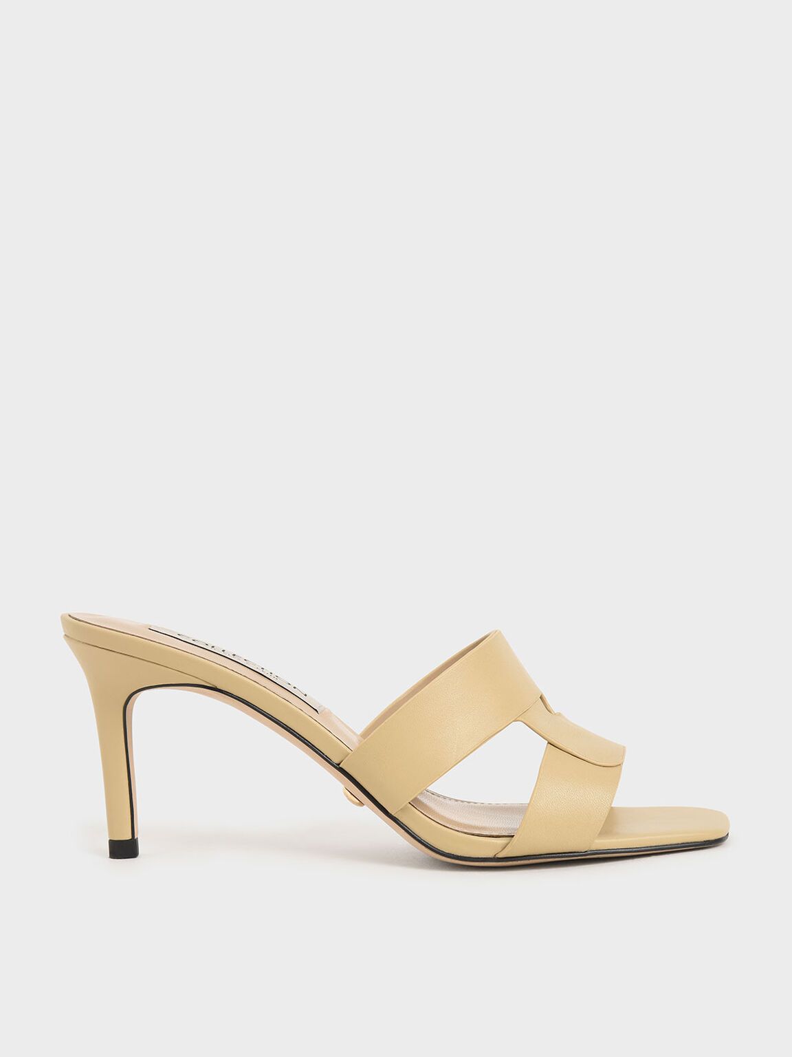 Kaya Leather Cut-Out Stiletto Mules in Beige, product photograph